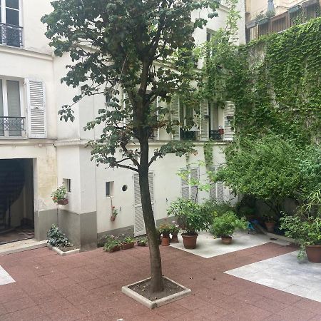 Tres Bel Appartement Montmartre Paris Exterior foto